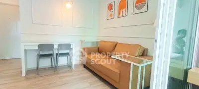 Modern living room with stylish decor and cozy seating area