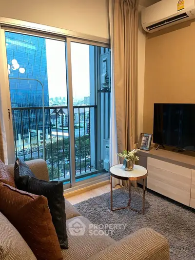 Modern living room with city view, cozy sofa, and stylish decor in high-rise apartment.