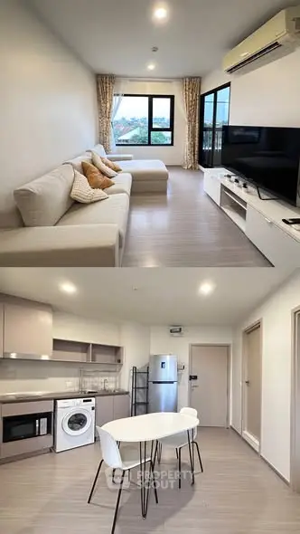 Modern living room with large TV and cozy kitchen with appliances