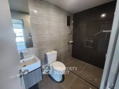 Modern bathroom with sleek design and spacious shower area