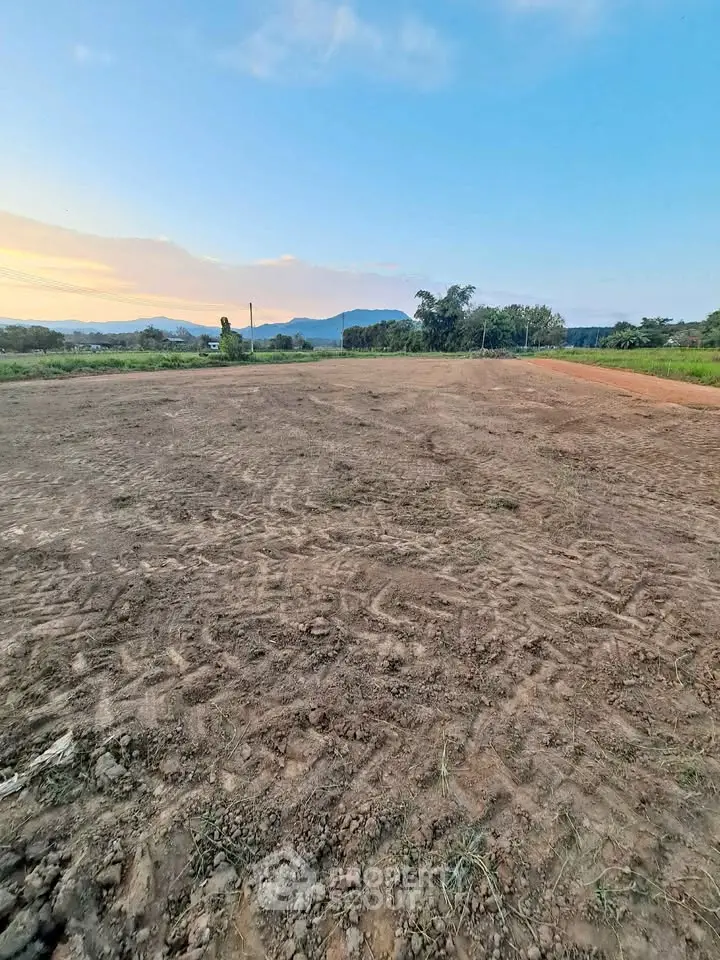 Expansive plot of land with scenic mountain views, perfect for development opportunities.