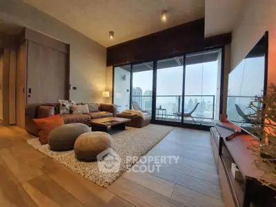 Luxurious living room with stunning city view and spacious balcony