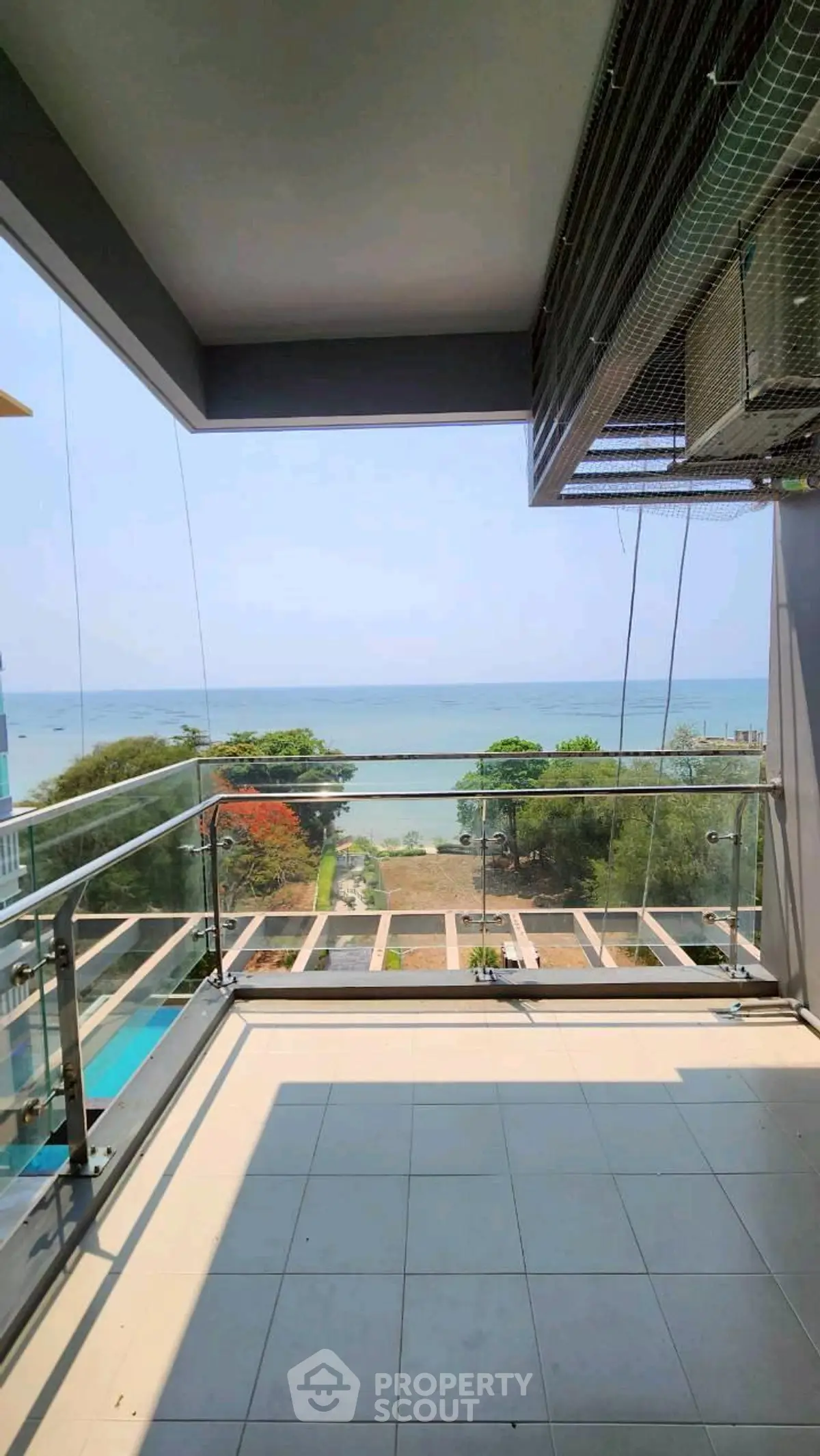 Stunning balcony with panoramic ocean view, perfect for relaxation and enjoying the sea breeze.