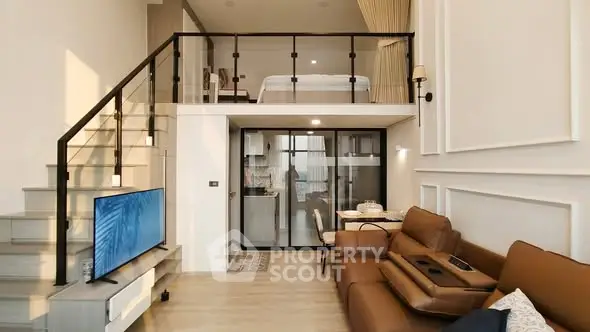 Modern loft apartment with stylish living room and mezzanine bedroom