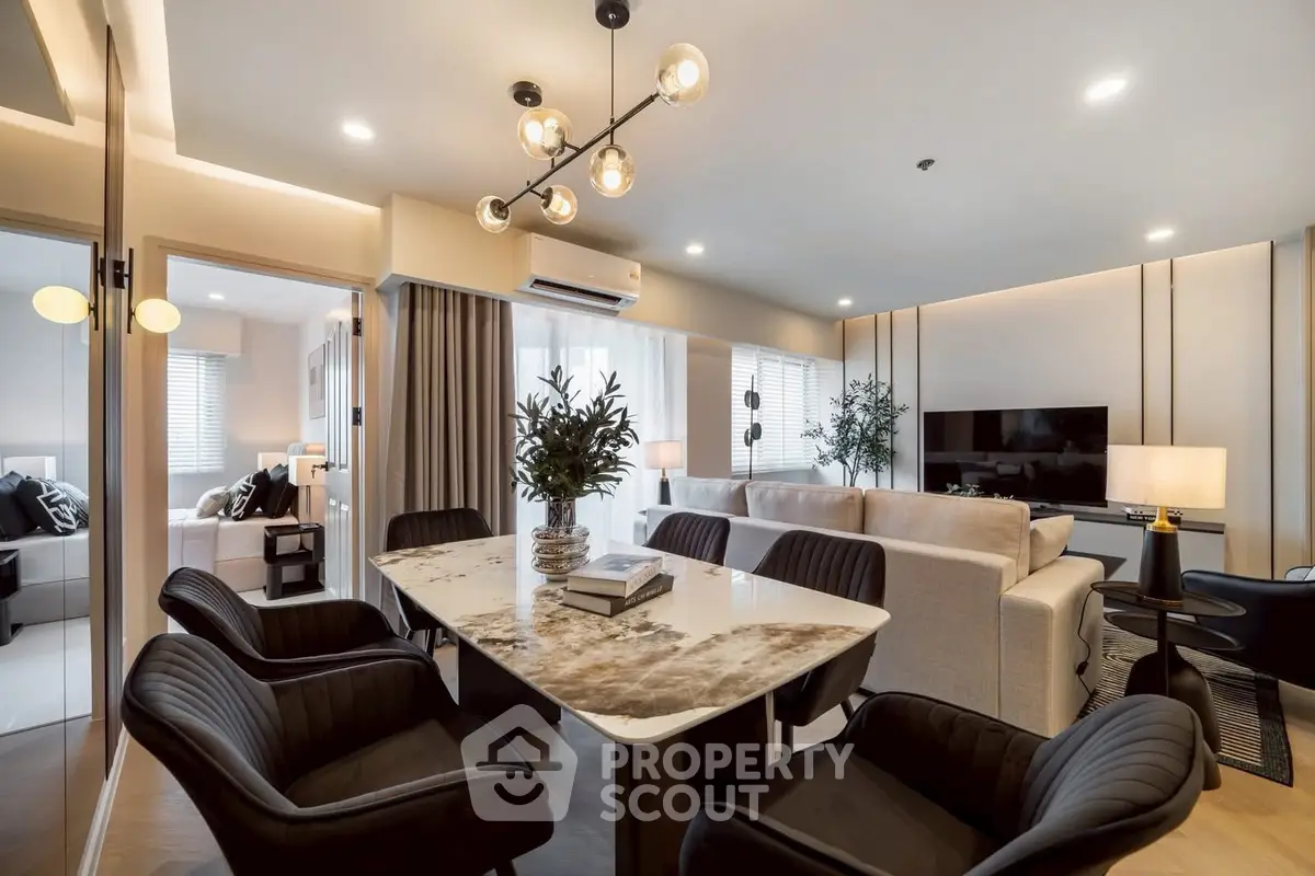 Luxurious modern living room with elegant dining area and stylish lighting