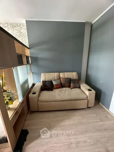 Cozy living room with modern sofa and stylish partition wall