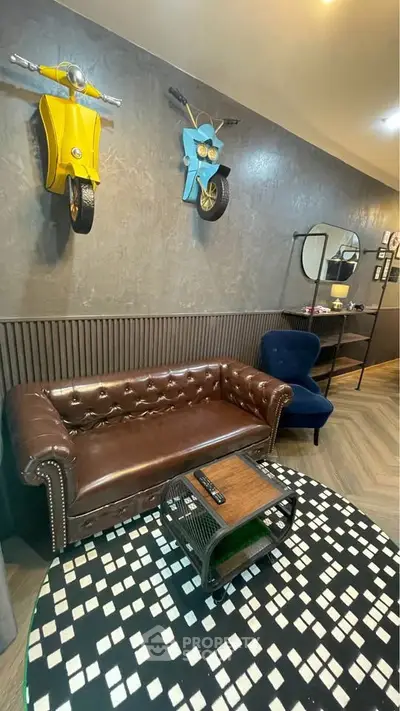 Stylish living room with unique scooter wall decor and chic furniture