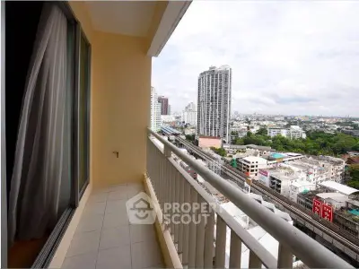 Spacious balcony with stunning city view in modern high-rise apartment