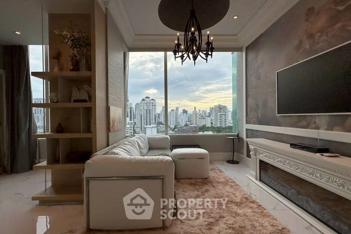Luxurious living room with stunning city view, elegant chandelier, and modern decor.