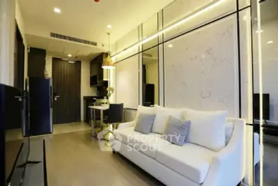 Modern living room with elegant decor and open layout in a stylish apartment.