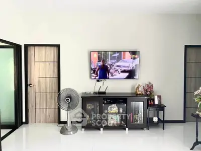 Modern living room with sleek TV setup and stylish decor