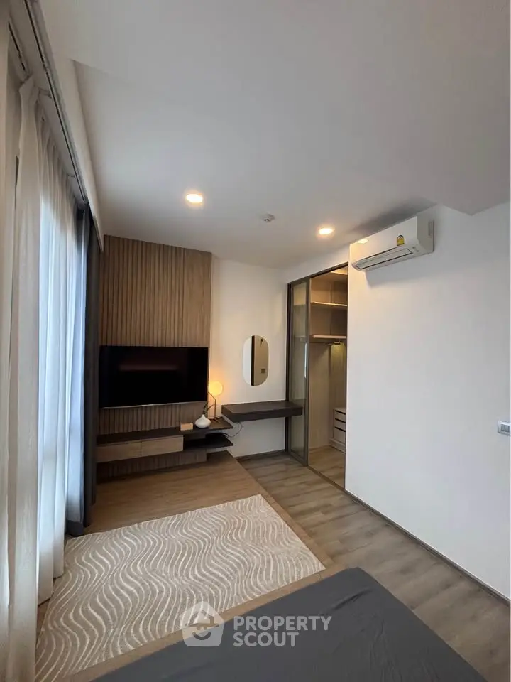 Modern bedroom with walk-in closet and stylish decor
