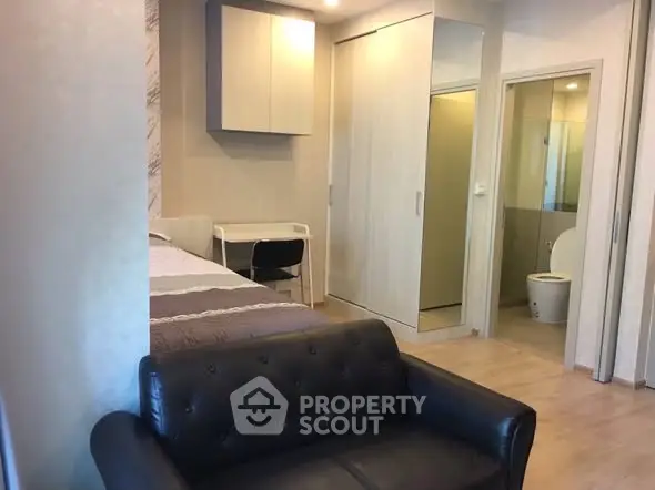 Modern studio apartment with sleek furnishings and compact design