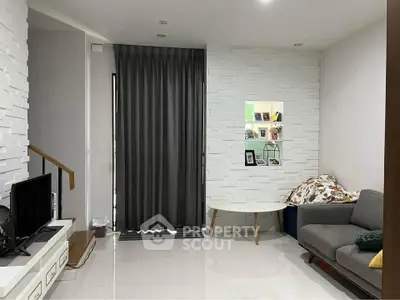 Modern living room with stylish decor and cozy seating area