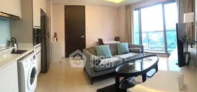 Modern living room with large windows and stylish furniture in a high-rise apartment.