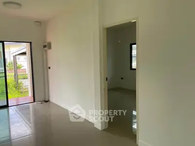 Spacious interior with open layout and garden view, perfect for modern living.