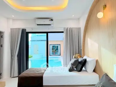 Luxurious bedroom with pool view, modern design and elegant decor.