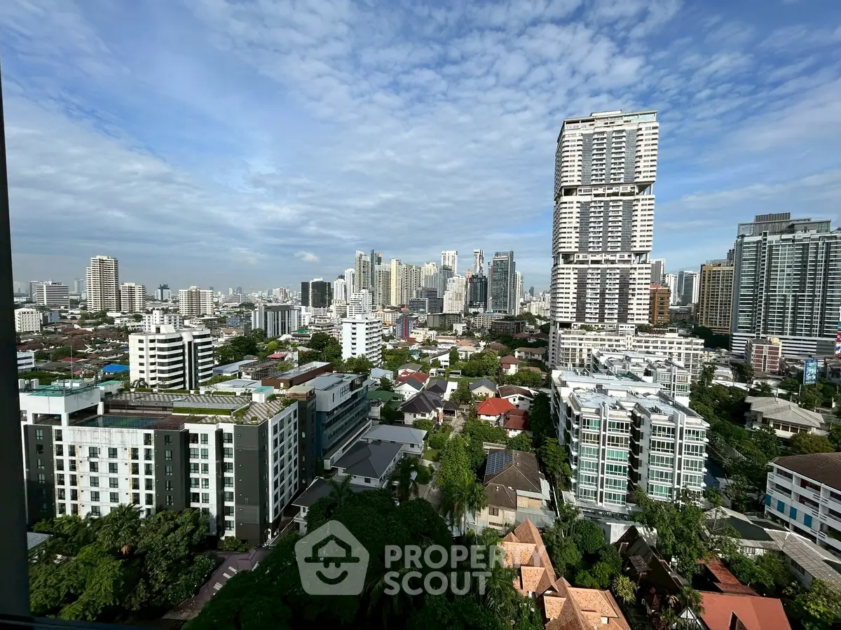 Stunning cityscape view showcasing modern high-rise buildings under a clear blue sky.