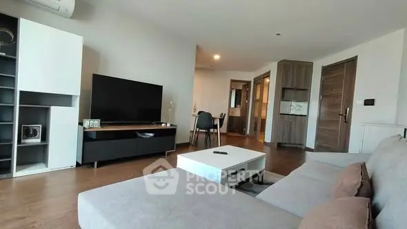 Modern living room with sleek furniture and open layout