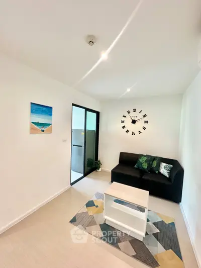 Modern living room with stylish decor and cozy seating area