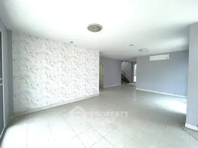 Spacious empty living room with modern design and natural light