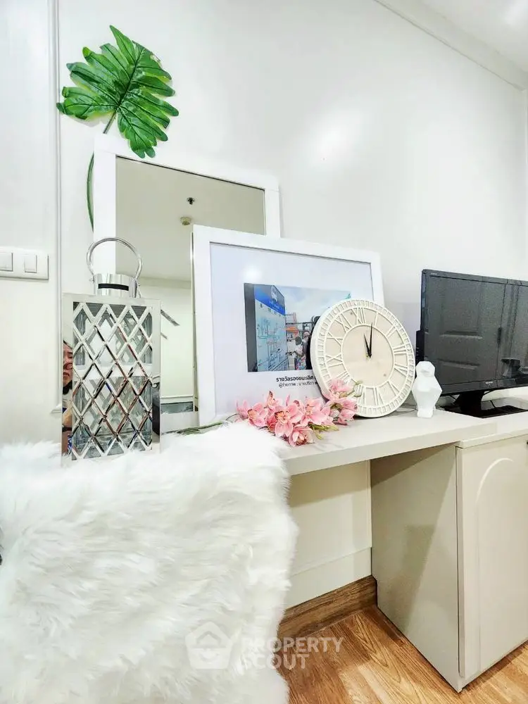 Stylish modern interior with decorative elements and cozy furnishings.