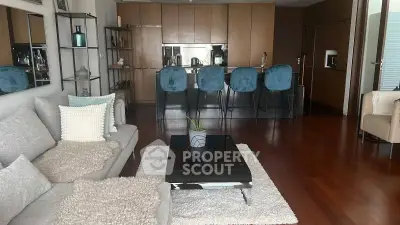 Luxurious open-plan living room with modern kitchen and stylish decor