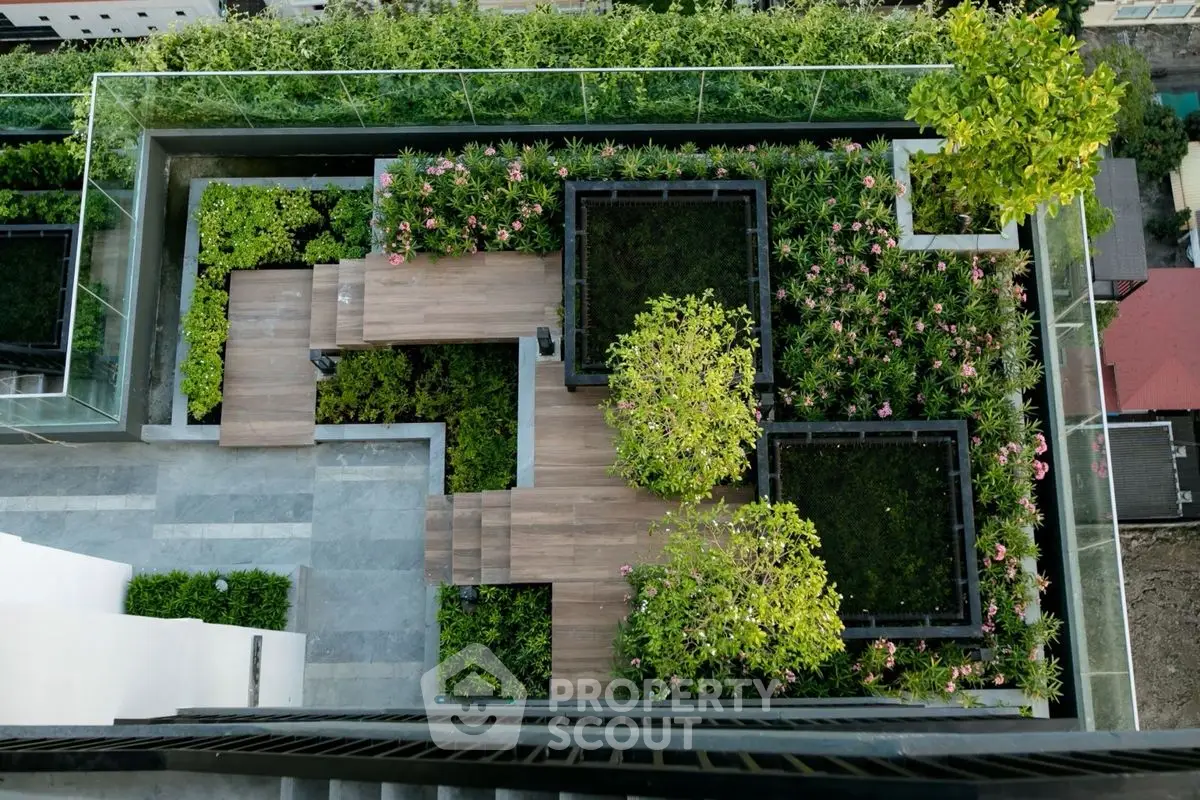 Stunning rooftop garden with lush greenery and modern design, offering a serene urban oasis.
