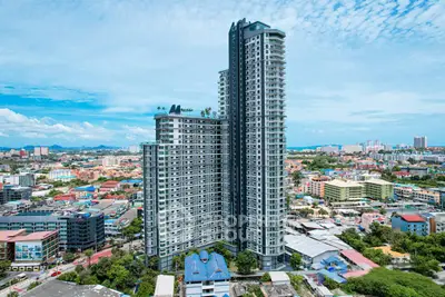 Stunning high-rise building with panoramic city views, showcasing modern architecture and urban living.