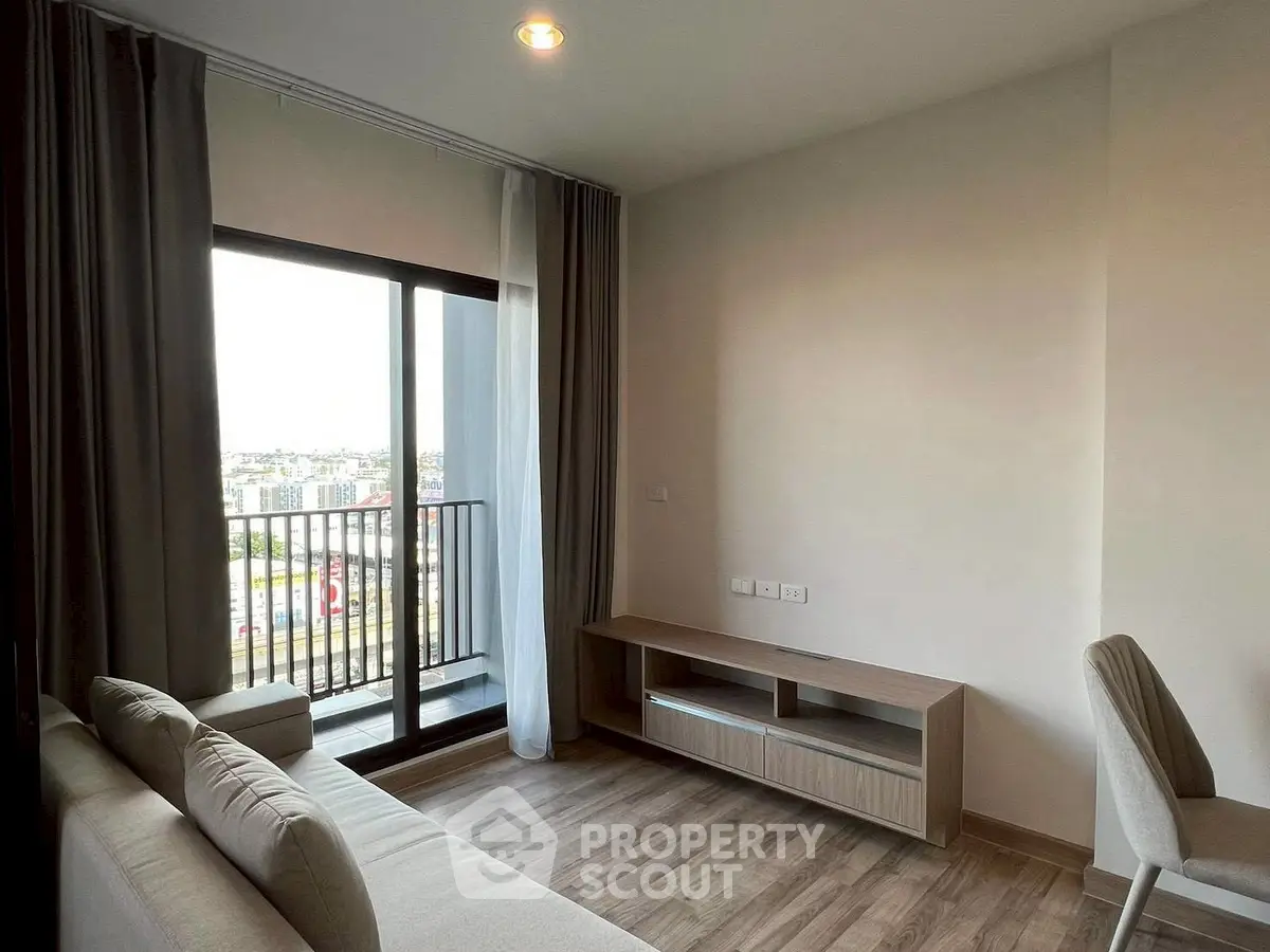 Modern living room with balcony view in a stylish apartment