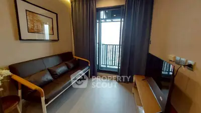 Cozy living room with balcony access and modern decor