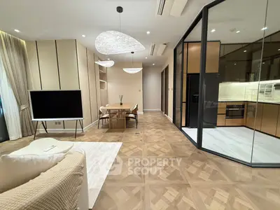 Luxurious modern living room with open kitchen and elegant lighting