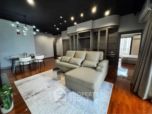 Spacious modern living room with elegant furniture and open layout, perfect for stylish urban living.