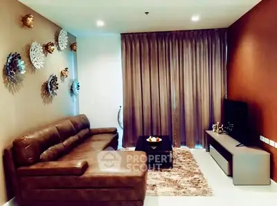 Stylish living room with modern decor and cozy leather sofa in elegant apartment.
