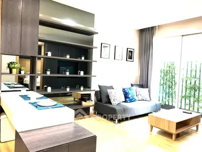 Modern living room with stylish decor and ample natural light