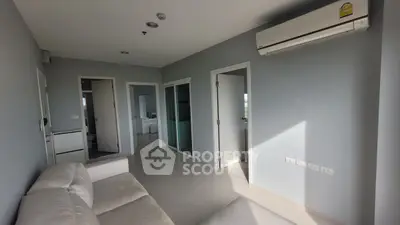 Modern living room with air conditioning and natural light