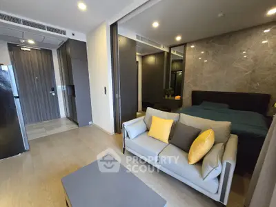 Modern studio apartment with stylish decor and cozy living area