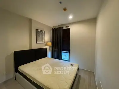 Cozy bedroom with modern decor and natural light