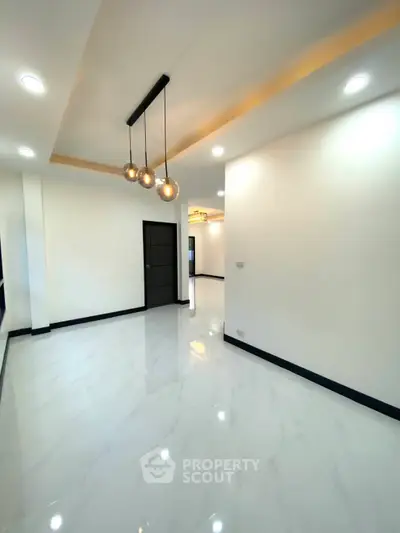 Spacious modern interior with elegant lighting and glossy flooring