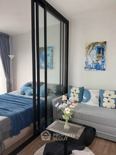 Chic modern bedroom with glass partition and cozy decor