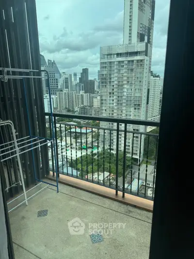 City view from high-rise balcony with modern skyline