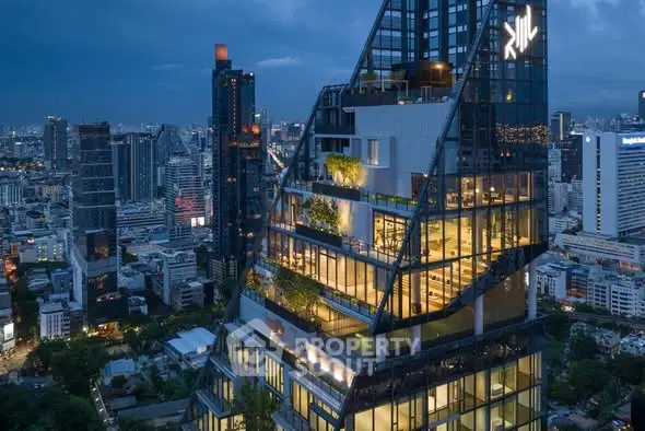 Stunning modern skyscraper with illuminated cityscape view at dusk