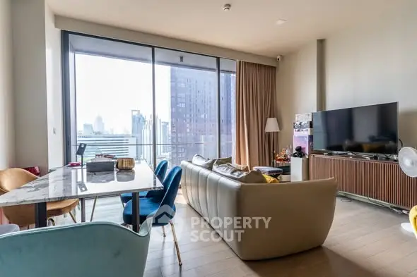 Spacious modern living room with city view and stylish furniture
