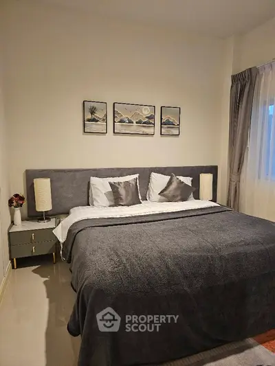 Elegant bedroom with modern decor and cozy ambiance