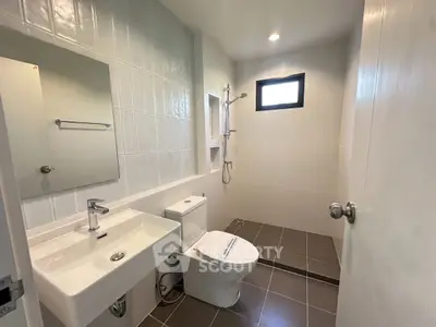 Modern bathroom with sleek fixtures and natural light