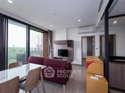 Modern living room with balcony view in a stylish apartment