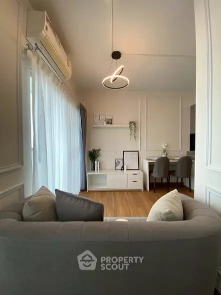 Chic modern living room with elegant decor and cozy seating area