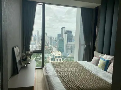 Luxurious bedroom with stunning city view in high-rise apartment