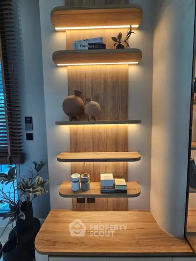 Modern interior with stylish wooden shelves and ambient lighting, perfect for contemporary living spaces.