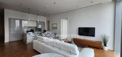 Luxurious modern living room with open kitchen and elegant marble island